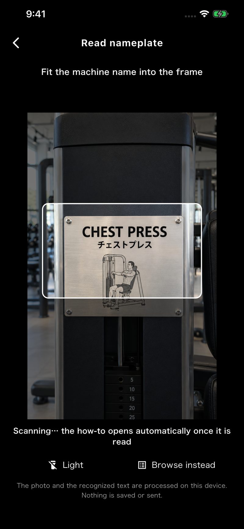 Muscle Mate's nameplate scan screen in English, with a chest press nameplate inside the camera frame